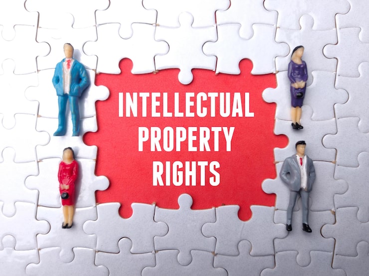 miniature poeple white puzzle with word intellectual property rights 406607 5961